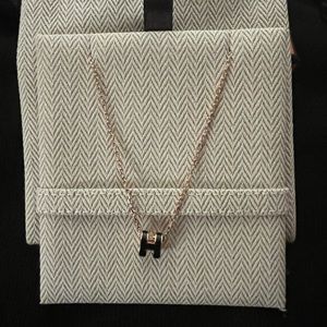 Hermes necklace rose gold and black H